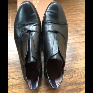 Black leather tommy